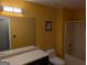 Well-lit bathroom with a large mirror, vanity, and shower-tub combo at 5700 Miles Rd, South Fulton, GA 30349