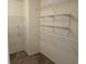 Walk-in closet with ample shelving for organization and storage at 5700 Miles Rd, South Fulton, GA 30349