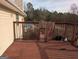 View of home's deck and backyard through the deck gate at 5700 Miles Rd, South Fulton, GA 30349