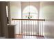 Bright foyer with large window and decorative chandelier creating a welcoming entrance at 5113 Heritage Oaks Sw Ln, Powder Springs, GA 30127