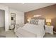 Modern bedroom features a plush bed, trendy decor, and neutral tones, creating a stylish retreat at 624 Whitman Lane # 2032, Stockbridge, GA 30281