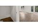 Bedroom featuring hard surface floors, a window to the backyard, and a closet at 624 Whitman Lane # 2032, Stockbridge, GA 30281