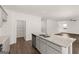 Bright kitchen features granite counters, stainless appliances, and walk-in pantry at 624 Whitman Lane # 2032, Stockbridge, GA 30281