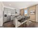 Spacious kitchen featuring granite countertops, stainless steel appliances, and seating at the island at 624 Whitman Lane # 2032, Stockbridge, GA 30281