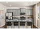 Modern kitchen featuring granite countertops, stainless steel appliances, and ample cabinet space at 624 Whitman Lane # 2032, Stockbridge, GA 30281