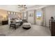 A large main bedroom with lots of natural light and a seating area at 624 Whitman Lane # 2032, Stockbridge, GA 30281