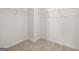 Walk-in closet featuring carpeted floors and wire shelving at 624 Whitman Lane # 2032, Stockbridge, GA 30281