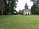 Spacious backyard with a shed, offering ample space for outdoor activities at 3095 Holbrook Sw Dr, Marietta, GA 30060