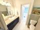 Bathroom featuring a sink, toilet, and shower/tub combination with modern fixtures at 3095 Holbrook Sw Dr, Marietta, GA 30060