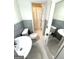 Well-lit bathroom featuring matching toilets and sinks, creating a serene space at 3095 Holbrook Sw Dr, Marietta, GA 30060