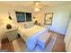 Bedroom with decorative pillows, bedside lamps, and a full-length mirror creates a welcoming, spacious atmosphere at 3095 Holbrook Sw Dr, Marietta, GA 30060