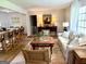 Open concept living room with a dining area and bar seating at kitchen island at 3095 Holbrook Sw Dr, Marietta, GA 30060