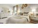 This bedroom boasts a large bed, dresser, and lovely decor for a relaxing ambiance at 1818 Butterfly Way, Marietta, GA 30066