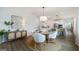 Open concept home featuring dining area with views of the kitchen, and modern decor at 1818 Butterfly Way, Marietta, GA 30066