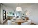Elegant dining area features modern lighting, neutral tones, and an open floor plan at 1818 Butterfly Way, Marietta, GA 30066