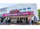 The historic Strand Theatre in Marietta, Georgia, showcasing a vibrant marquee and inviting entrance at 1818 Butterfly Way, Marietta, GA 30066