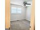 Bedroom with carpeted floors, ceiling fan and window with blinds at 401 Mt. Tabor Church Rd., Dallas, GA 30157