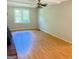Spacious living room with natural light, hardwood floors, and a fireplace at 401 Mt. Tabor Church Rd., Dallas, GA 30157