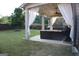 Spacious backyard featuring a patio, trampoline and swing set; perfect for Gathering fun! at 878 W Union Grove Cir, Auburn, GA 30011