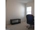 A versatile space featuring neutral carpet and a window for natural light is perfect for a home office or guest room at 878 W Union Grove Cir, Auburn, GA 30011