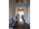 Entry foyer with hardwood floors, bench seating, and access to the main living area at 878 W Union Grove Cir, Auburn, GA 30011