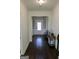 Hallway with hardwood flooring, wainscoting, and a bench seat at 878 W Union Grove Cir, Auburn, GA 30011