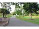 Inviting walking path in a lush park setting, perfect for a stroll with pets and loved ones at 878 W Union Grove Cir, Auburn, GA 30011