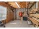 Unfinished basement with wood beams and concrete walls offering ample storage space at 150 Cold Harbor Ct, Sharpsburg, GA 30277