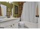 Traditional bathroom featuring a shower and tub combination at 150 Cold Harbor Ct, Sharpsburg, GA 30277