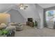 Bonus room with a television, natural light, and cozy seating at 150 Cold Harbor Ct, Sharpsburg, GA 30277