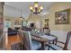Open concept dining area with a view into the living room, perfect for entertaining at 150 Cold Harbor Ct, Sharpsburg, GA 30277