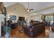 Bright and airy living room featuring hardwood floors, high ceilings, and comfortable furniture at 150 Cold Harbor Ct, Sharpsburg, GA 30277