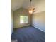Bedroom with a high vaulted ceiling, a window, and a ceiling fan at 5678 Mill View Way, Lithonia, GA 30038