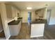Kitchen featuring grey cabinets, dark countertops, modern hardware and hardwood floors at 5678 Mill View Way, Lithonia, GA 30038