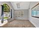 Spacious bonus room with vaulted ceilings, a skylight, and large arched window overlooking the lawn at 503 Atwood Cir, Peachtree City, GA 30269
