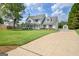 Traditional two-story home featuring a welcoming front porch and well-maintained landscaping at 503 Atwood Cir, Peachtree City, GA 30269