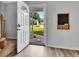 Inviting entryway featuring natural light, a view of the front yard, and a decorative chalkboard at 503 Atwood Cir, Peachtree City, GA 30269