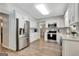 Bright kitchen features stainless steel appliances, and white cabinets at 503 Atwood Cir, Peachtree City, GA 30269
