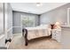 Neutral bedroom offers carpeted floors, a side table and gray painted walls at 111 Biltmore Trce, Peachtree City, GA 30269