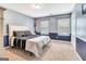 Bedroom features carpeted floors, two-toned paint and a bed with a padded headboard at 111 Biltmore Trce, Peachtree City, GA 30269