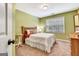 Cozy bedroom featuring a comfortable bed and a window at 111 Biltmore Trce, Peachtree City, GA 30269
