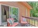 Relaxing outdoor patio area featuring comfortable seating and wooded scenery at 29 Clark Pl, Whitesburg, GA 30185