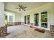 Covered patio with french doors leading to the interior at 377 Parker Rd, Mcdonough, GA 30252