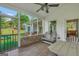 Screened in porch with outdoor seating and a view of the backyard at 377 Parker Rd, Mcdonough, GA 30252