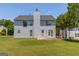 The backyard of this home has a nice concrete patio, a door to the kitchen, and a large grassy area at 2990 Haynes Club Cir, Grayson, GA 30017