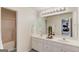 This bathroom features a double vanity, large mirror, and separate shower and tub at 2990 Haynes Club Cir, Grayson, GA 30017