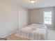 This bedroom features a large closet and a window that lets in lots of light at 2990 Haynes Club Cir, Grayson, GA 30017