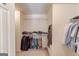 The spacious walk-in closet features organized shelving and plenty of room for storage at 2990 Haynes Club Cir, Grayson, GA 30017