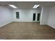 Basement with neutral tile, ample space, and a window providing natural light at 172 Oak Forest Se Dr, Smyrna, GA 30082