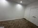 Finished basement space with white trim and carpet, great for additional living space at 172 Oak Forest Se Dr, Smyrna, GA 30082